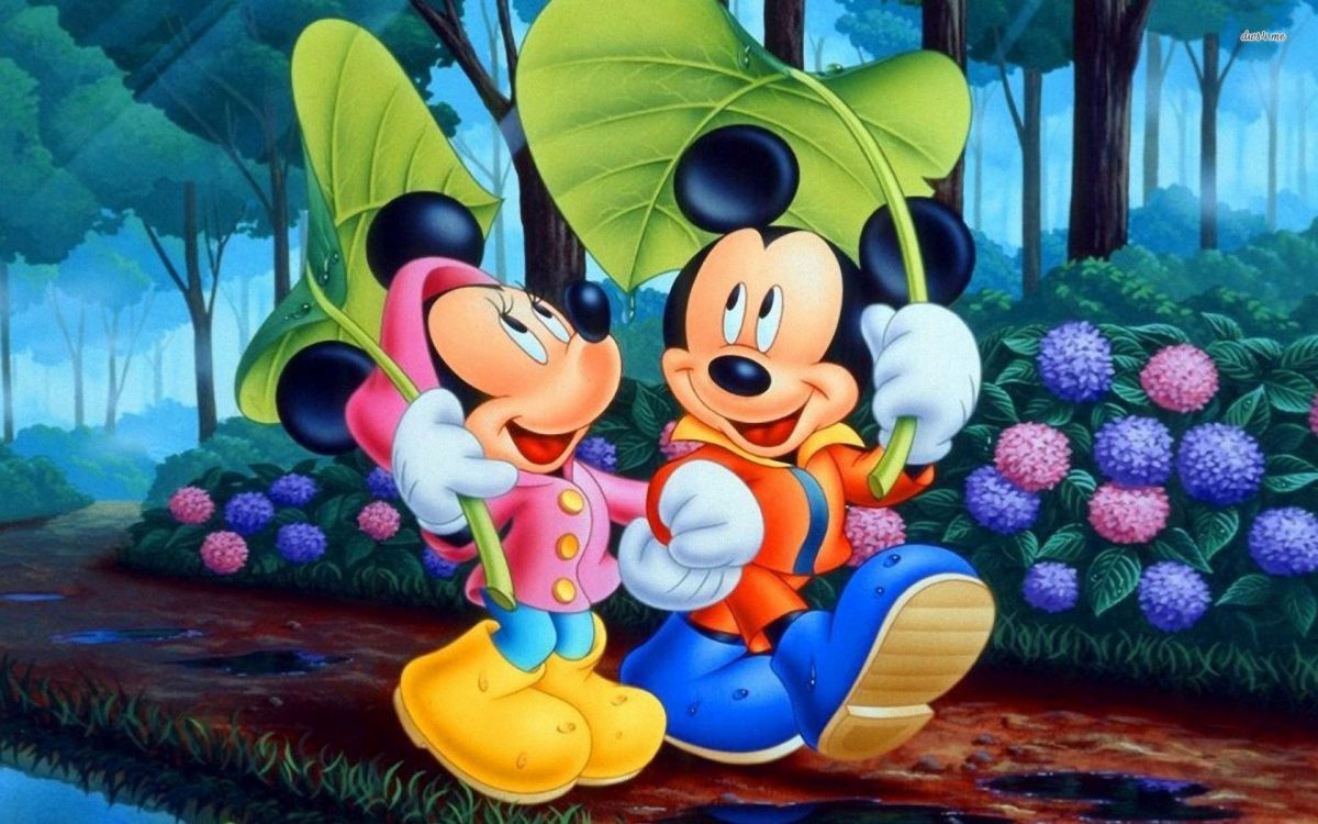 Imágen de amor de Minnie y Mickey paseando en el parque tomados de la mano